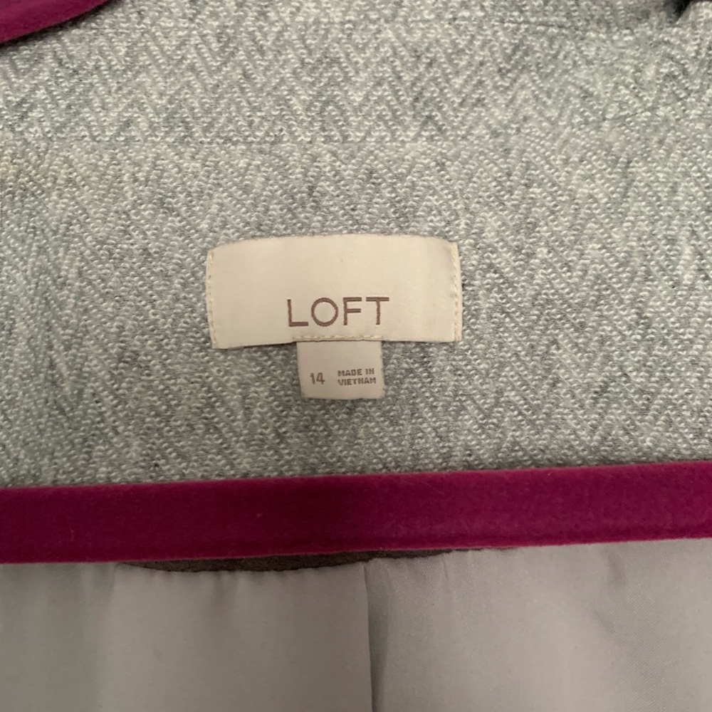 Women’s wool Ann Taylor loft blazer with leather elbow patches.